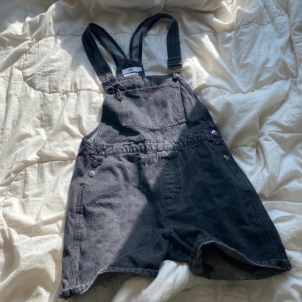 Twink from Simmons black overall shorts